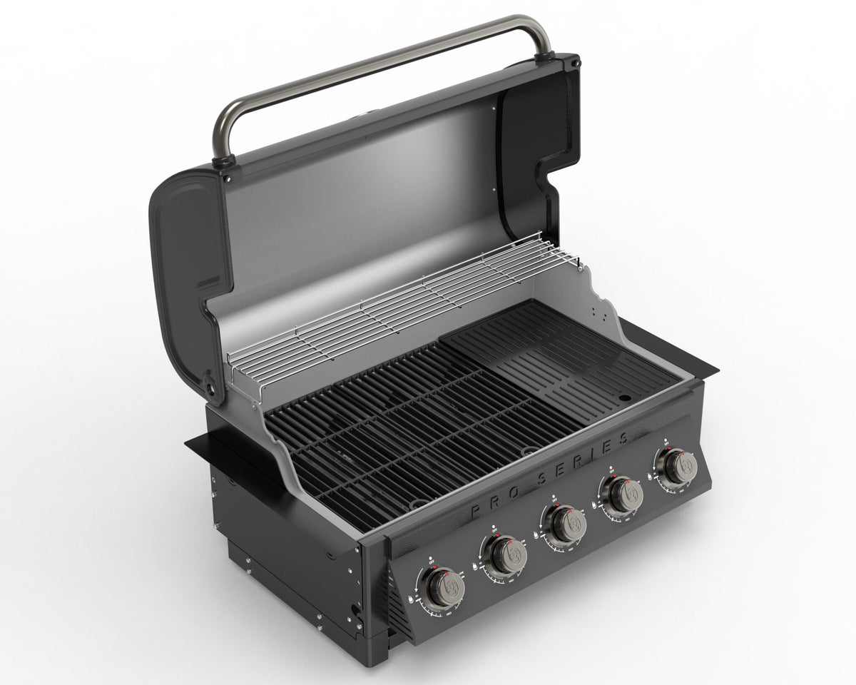 Coleman Pro Series built in bbq with the lid open, showing the 5-burner grill and warming rack