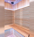 Inside the Chill Bunny indoor infrared sauna showing cedar slats, bench and lighting