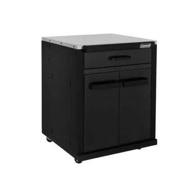 Angled view of Coleman Revolution storage module with drawer in black matte